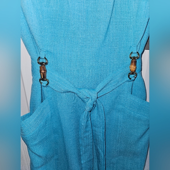 Cocktail length turquoise colored dress. Pockets and belt. Size 8 - Picture 6 of 7